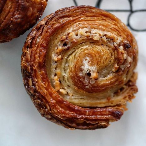 It's dinner time but I crave a #kouignamann . A @yeastbakery #hazelnut kouign amann. So buttery, flak